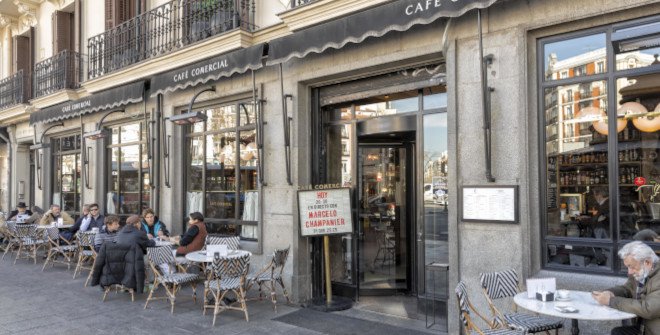 Café Comercial in Madrid, a historic literary café with artistic charm and vibrant atmosphere.